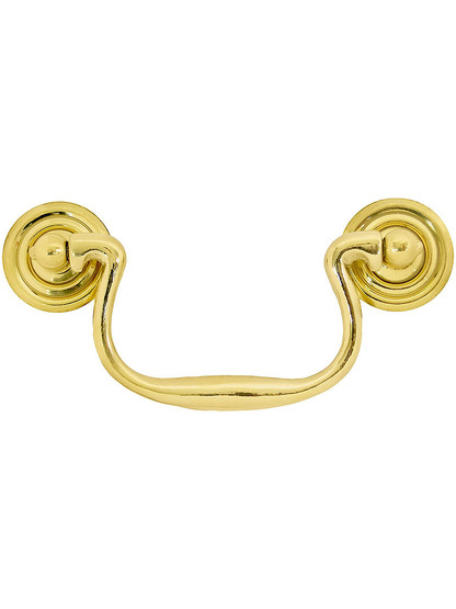 Swan-Neck Brass Bail Pull with Ringed Round Rosettes ‚Äì 3 ¬Ω‚Äù Center-to-Center in Unlacquered Brass Finish.